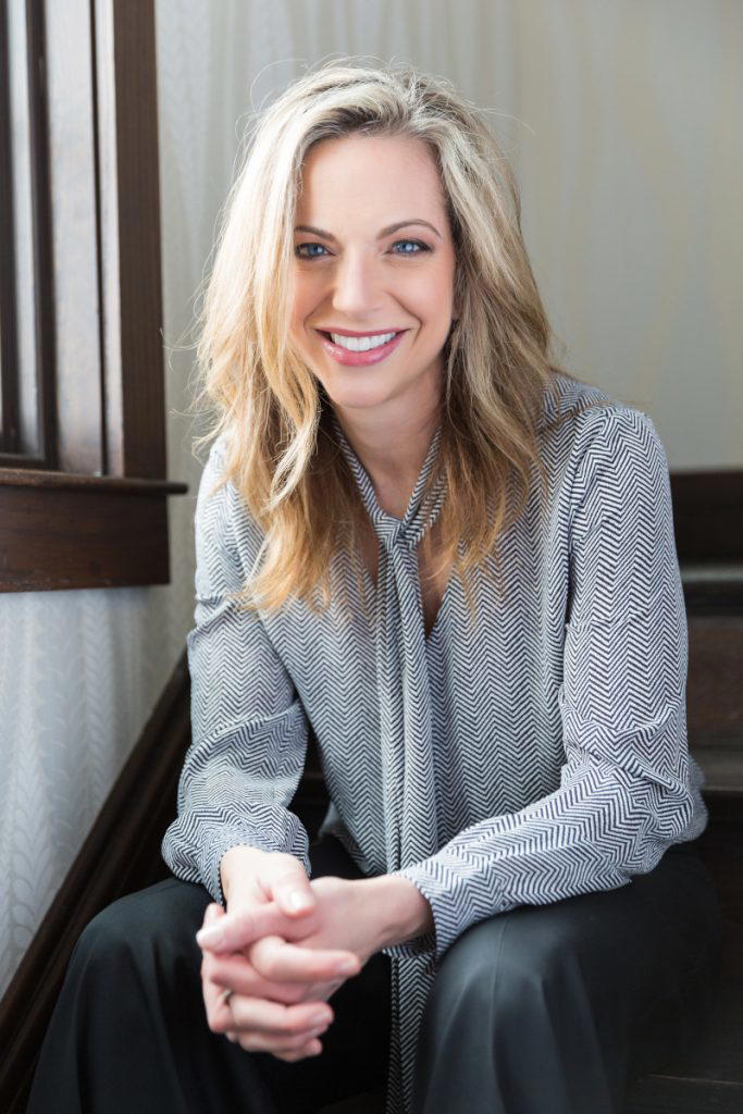 Beth Fisher sitting on steps